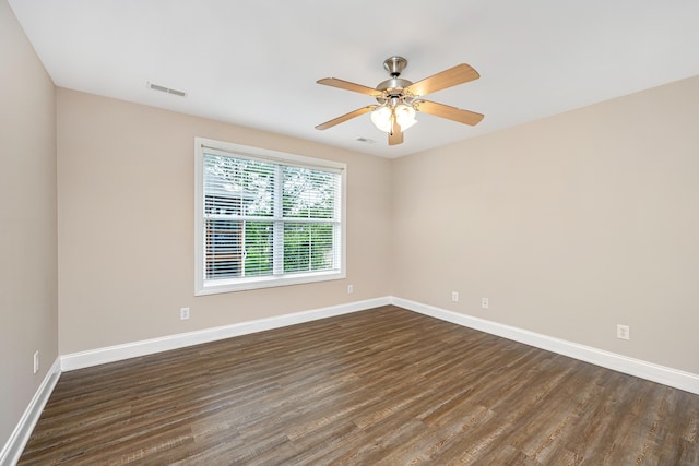 2301 N Creek Dr, Mount Pleasant, SC 29466 - spare room featuring dark wood-type flooring, baseboards, and ceiling fan