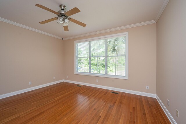 2301 N Creek Dr, Mount Pleasant, SC 29466 - spare room with light wood finished floors, baseboards, ornamental molding, and ceiling fan