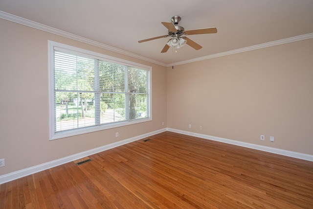 2301 N Creek Dr, Mount Pleasant, SC 29466 - spare room featuring baseboards, ornamental molding, a ceiling fan, and wood finished floors