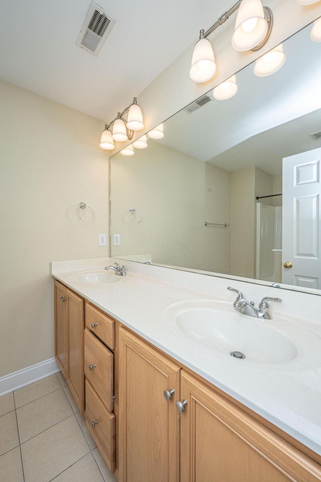 2301 N Creek Dr, Mount Pleasant, SC 29466 - bathroom with double vanity, tile patterned floors, and baseboards