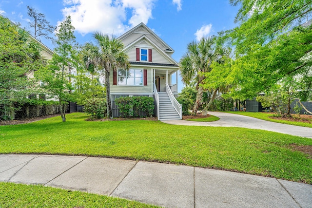 2301 N Creek Dr, Mount Pleasant, SC 29466 - coastal home with stairway, driveway, and covered porch