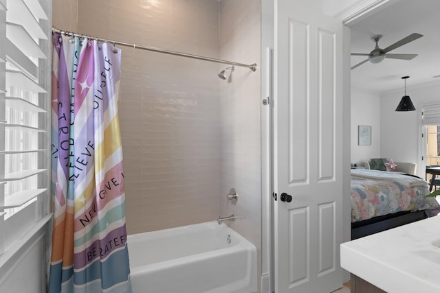 ensuite bathroom with connected bathroom and shower / tub combo with curtain