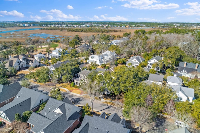 birds eye view of property with a residential view and a water view