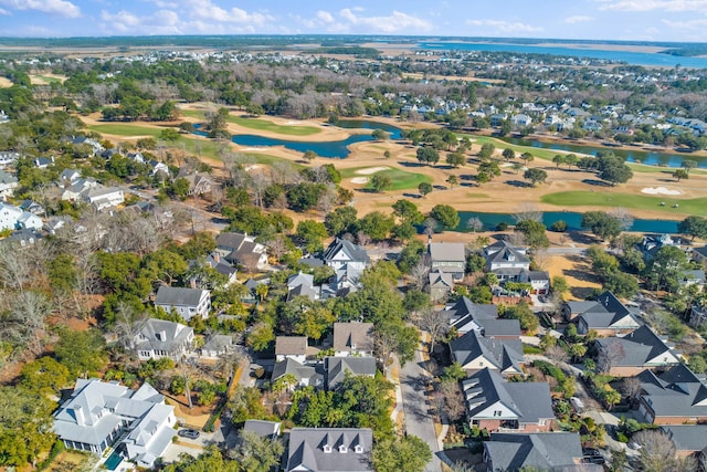 bird's eye view featuring view of golf course, a water view, and a residential view