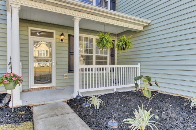 entrance to property with covered porch