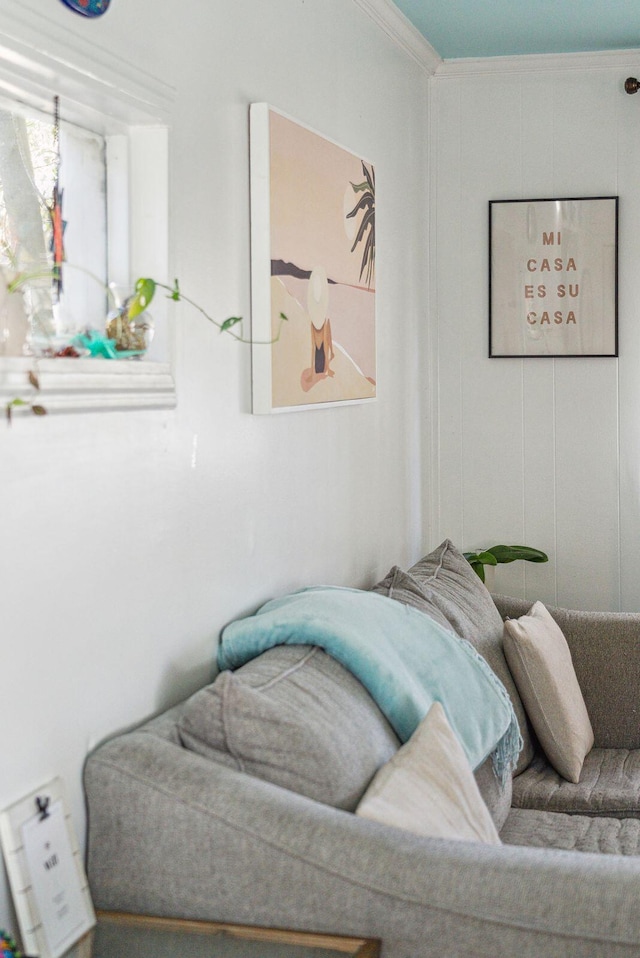 interior space with crown molding