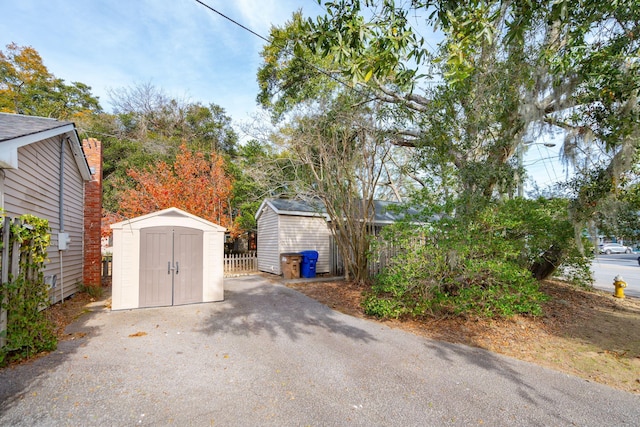 exterior space with a shed