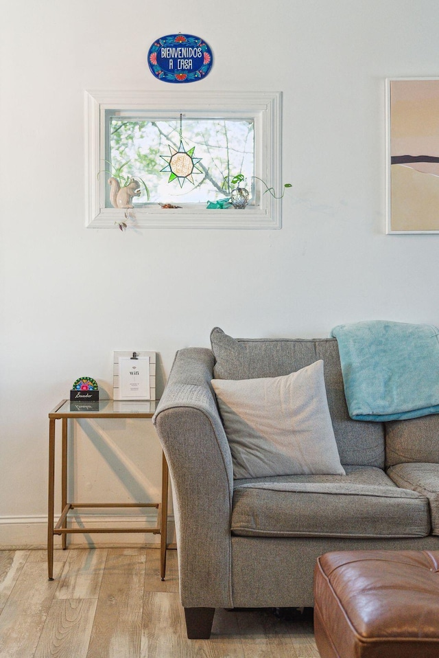 sitting room with hardwood / wood-style floors