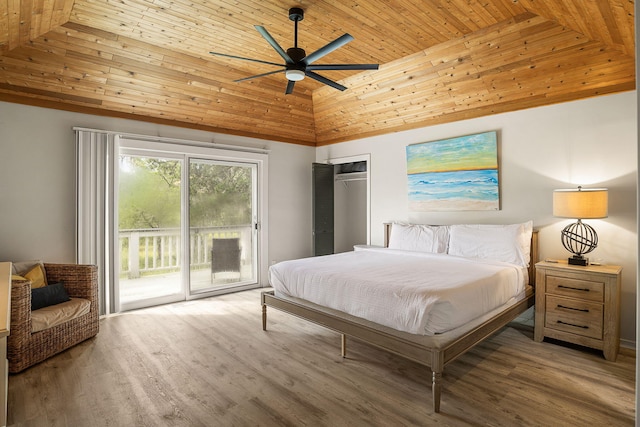 bedroom featuring wooden ceiling, access to exterior, high vaulted ceiling, and wood finished floors