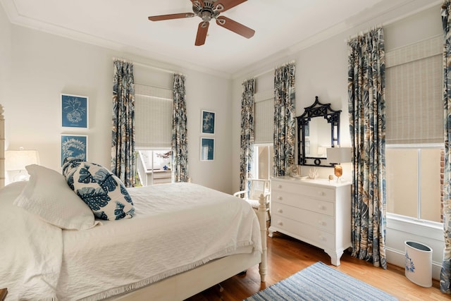 18 Fernandina St, Mount Pleasant, SC 29464 - bedroom featuring wood finished floors, ornamental molding, and ceiling fan