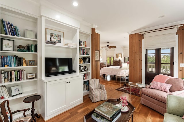 18 Fernandina St, Mount Pleasant, SC 29464 - living area featuring wood finished floors, a ceiling fan, and ornamental molding