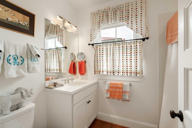 18 Fernandina St, Mount Pleasant, SC 29464 - bathroom with vanity, toilet, and wood finished floors