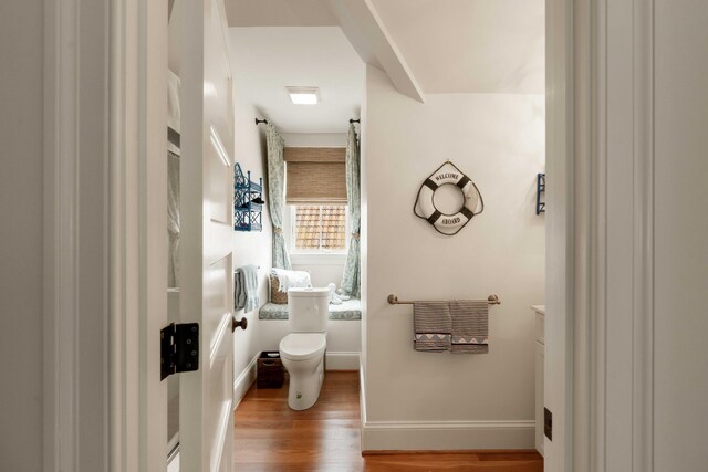 18 Fernandina St, Mount Pleasant, SC 29464 - half bathroom with toilet, wood finished floors, and baseboards