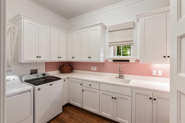 18 Fernandina St, Mount Pleasant, SC 29464 - laundry room with cabinet space, washer and dryer, ornamental molding, and dark wood finished floors