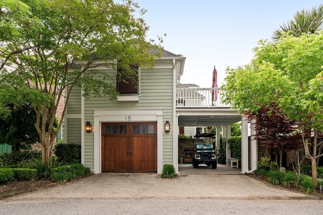 18 Fernandina St, Mount Pleasant, SC 29464 - view of front of home featuring a garage, a balcony, driveway, and a carport