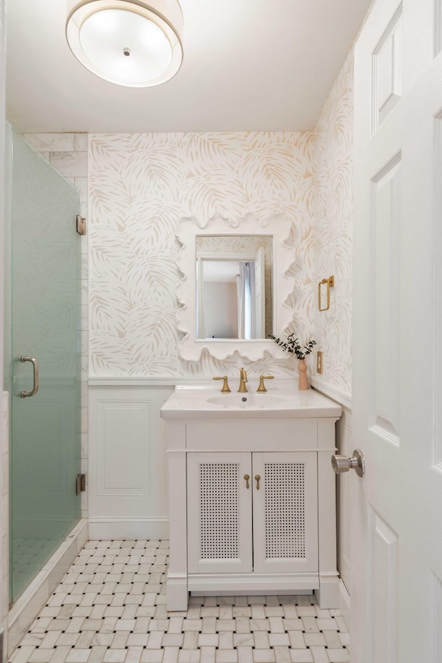 814 Rutledge Ave, Charleston, SC 29403 - bathroom featuring wallpapered walls, wainscoting, a stall shower, vanity, and a decorative wall