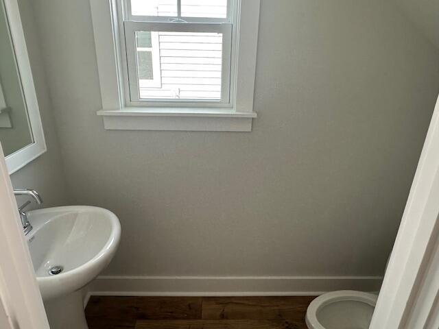 4126 Ohear Ave, North Charleston, SC 29406 - bathroom featuring baseboards and wood finished floors