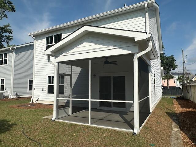 4126 Ohear Ave, North Charleston, SC 29406 - back of house with a sunroom, ceiling fan, and a patio