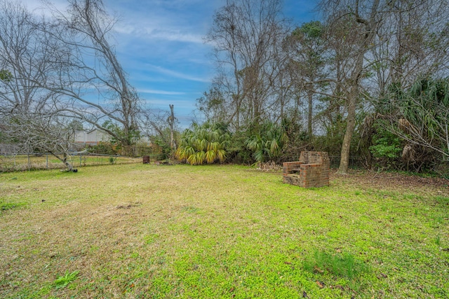 view of yard with fence