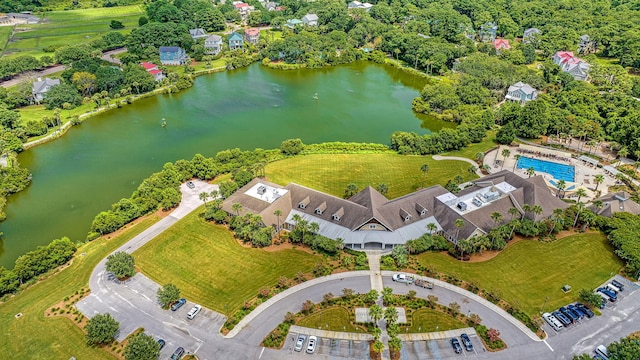 birds eye view of property with a water view