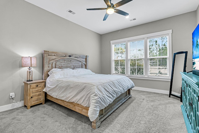 bedroom with ceiling fan and carpet floors