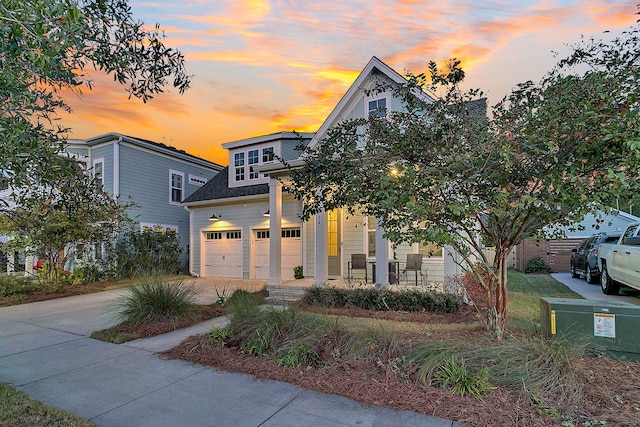 view of front of property with a garage