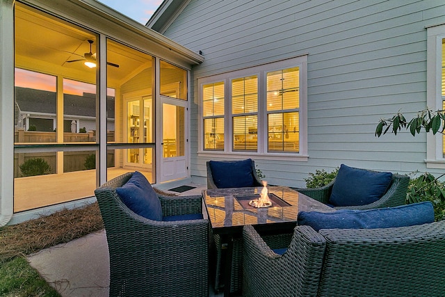 view of patio / terrace featuring an outdoor fire pit