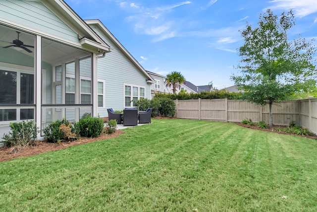 view of yard featuring ceiling fan