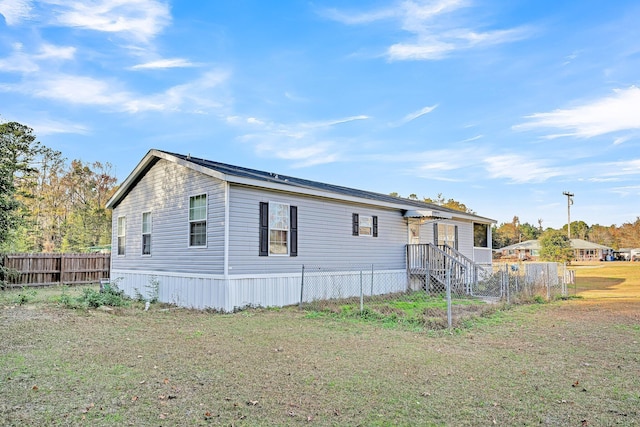 exterior space featuring a front lawn