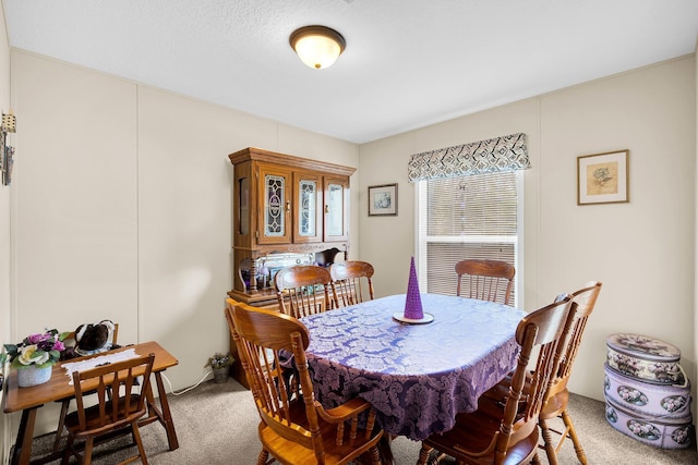 view of carpeted dining room