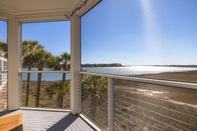 balcony featuring a water view