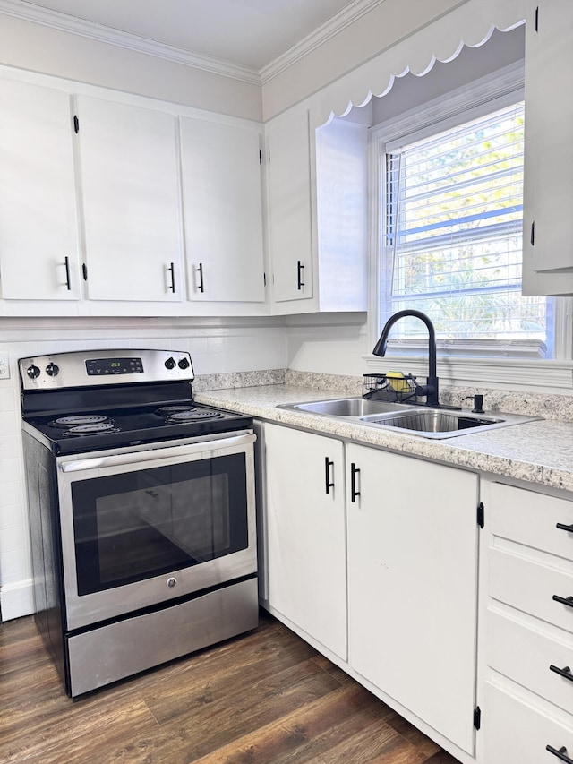 kitchen with ornamental molding, sink, electric range, dark hardwood / wood-style floors, and white cabinetry