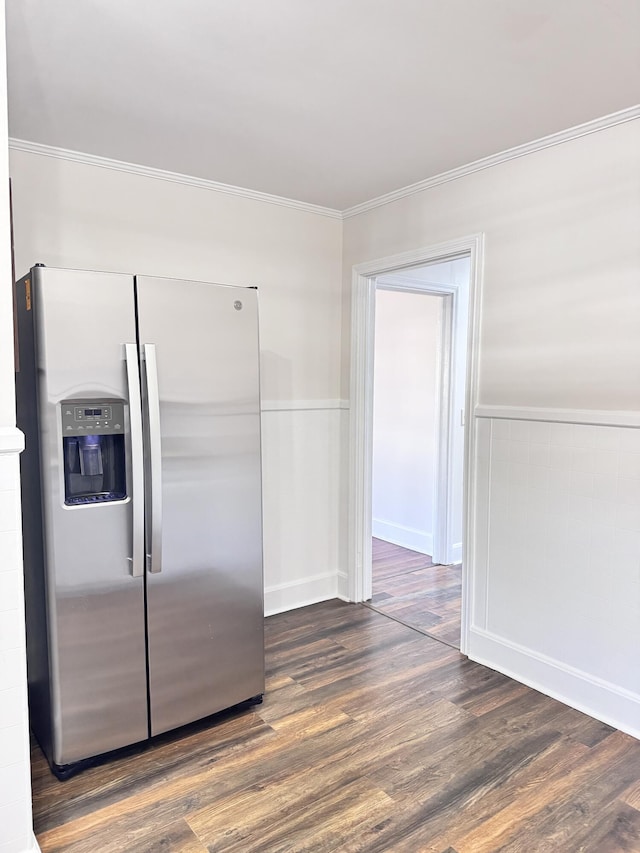 kitchen with stainless steel fridge with ice dispenser, dark hardwood / wood-style floors, and ornamental molding