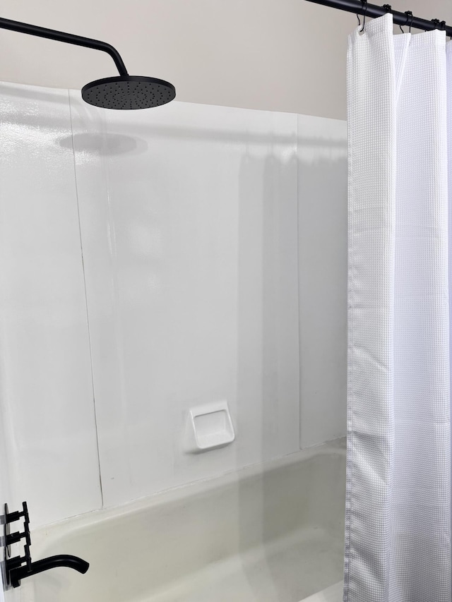 bathroom with a shower with curtain