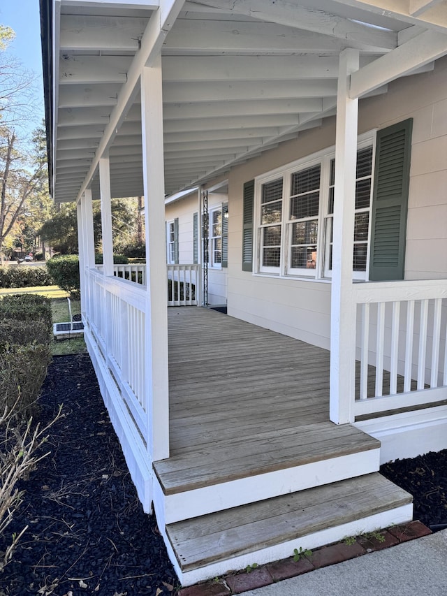 wooden deck featuring a porch