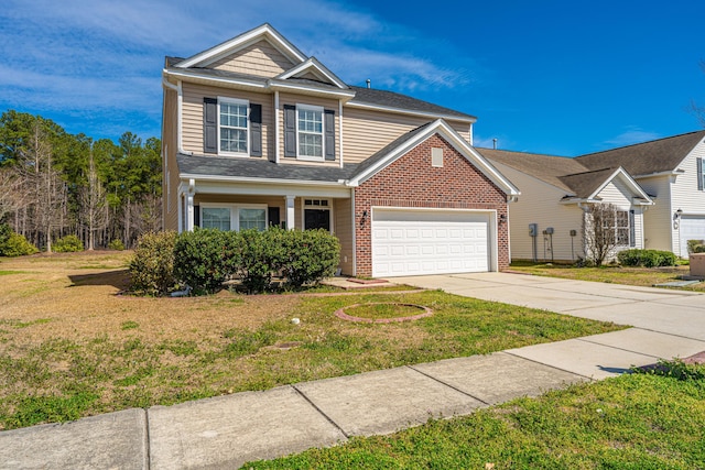 traditional home with a front yard, brick siding, driveway, and an attached garage