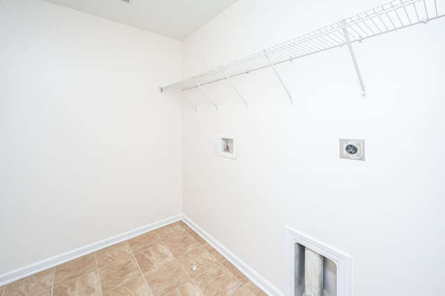 laundry room with laundry area, hookup for a washing machine, baseboards, and hookup for an electric dryer