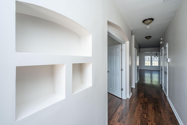 corridor with wood finished floors