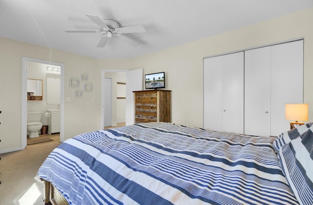 bedroom with baseboards, carpet floors, ensuite bath, ceiling fan, and a closet