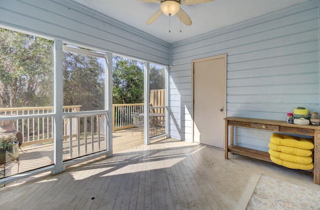 exterior space featuring ceiling fan