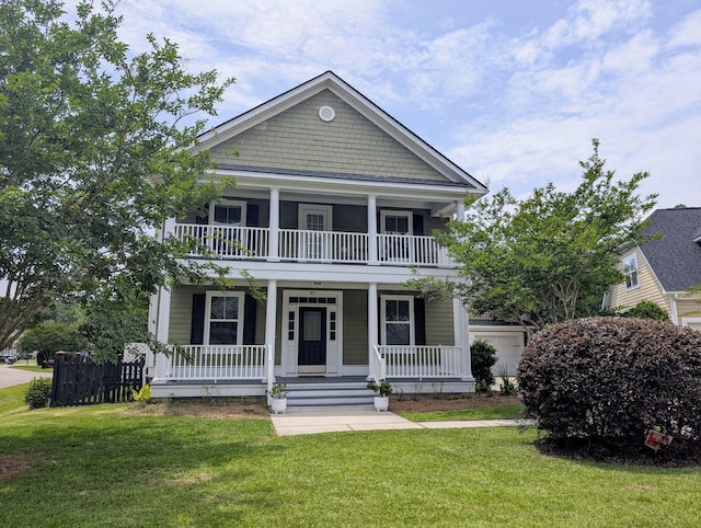 911 Hunt Clb, Charleston, SC 29414 - view of front of home featuring covered porch, a balcony, and a front lawn
