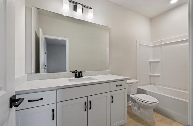 full bathroom featuring hardwood / wood-style flooring, vanity, toilet, and tub / shower combination