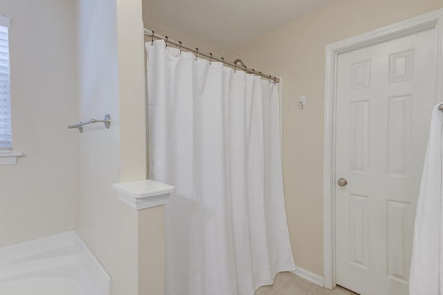 5105 Parrum Ct, Summerville, SC 29485 - bathroom featuring tile patterned floors, a tub to relax in, and a shower with shower curtain