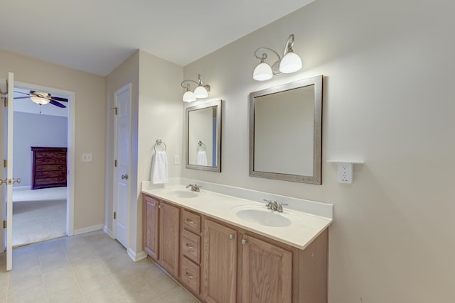 5105 Parrum Ct, Summerville, SC 29485 - bathroom featuring double vanity, ceiling fan, and tile patterned floors