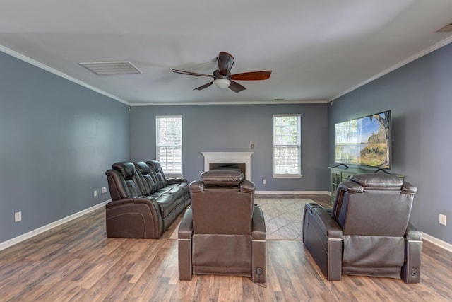 5105 Parrum Ct, Summerville, SC 29485 - living room featuring wood finished floors, a ceiling fan, ornamental molding, and a fireplace
