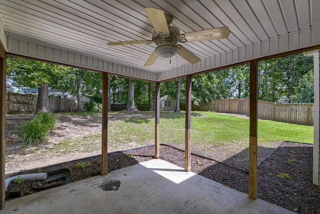 5105 Parrum Ct, Summerville, SC 29485 - fenced backyard with a ceiling fan, a patio area, and a storage unit