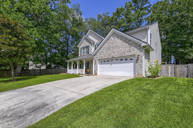 5105 Parrum Ct, Summerville, SC 29485 - traditional-style home with an attached garage, driveway, brick siding, and covered porch