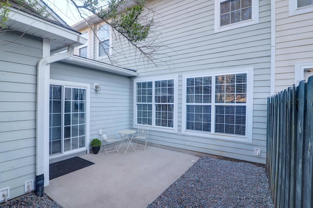 view of patio / terrace featuring fence