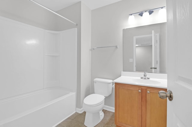 full bathroom featuring toilet, vanity,  shower combination, tile patterned flooring, and baseboards