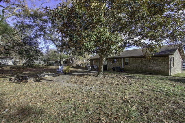 view of yard featuring central AC